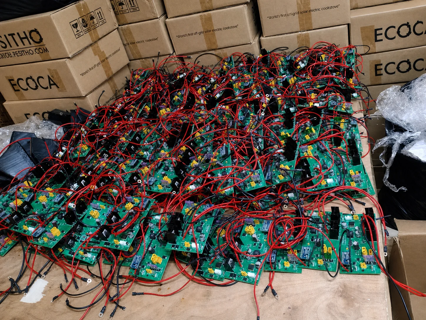 A large batch of power-control boards undergoing recovery and verification